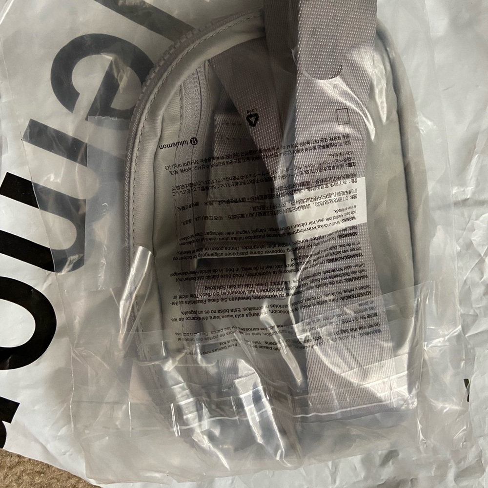 lululemon silver/gray belt bag!! brand new in bag!!